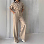Women’s loose waist jumpsuit by Wanita Store featuring wide-leg pants, slim fit, collared overalls, and a stylish one-piece design.