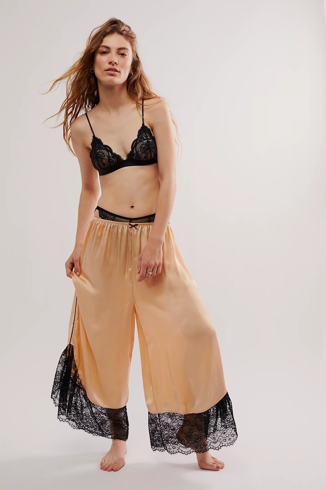 Women’s lace satin stitching loose wide-leg casual trousers from Wanita Store, featuring a comfortable office-appropriate bottom.