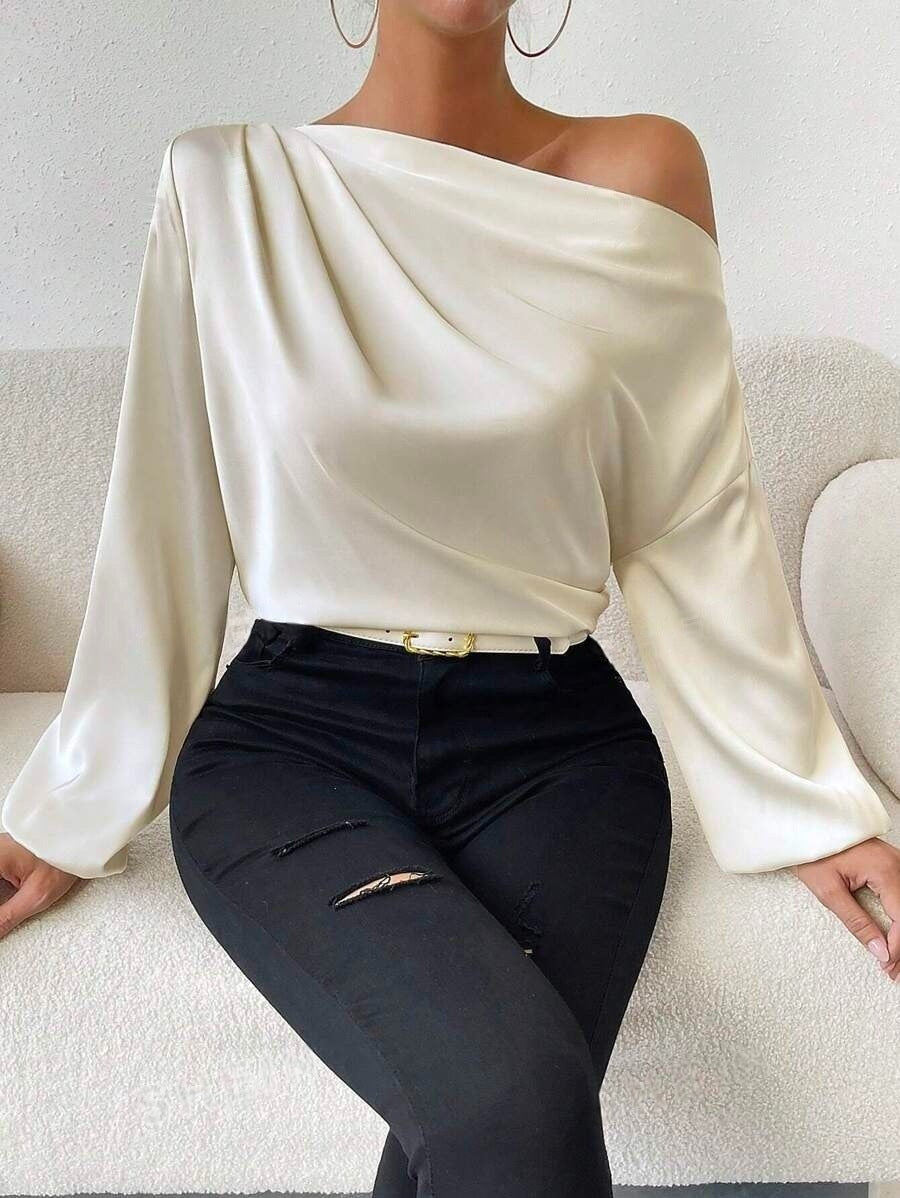 Bella Mia women's long sleeve satin pullover top with oblique shoulder design and asymmetric silhouette in solid color.