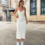 Sexy women's mid-length lace-up dress with low cut V-neck, backless design, halter style, and cutout details in autumn fashion.