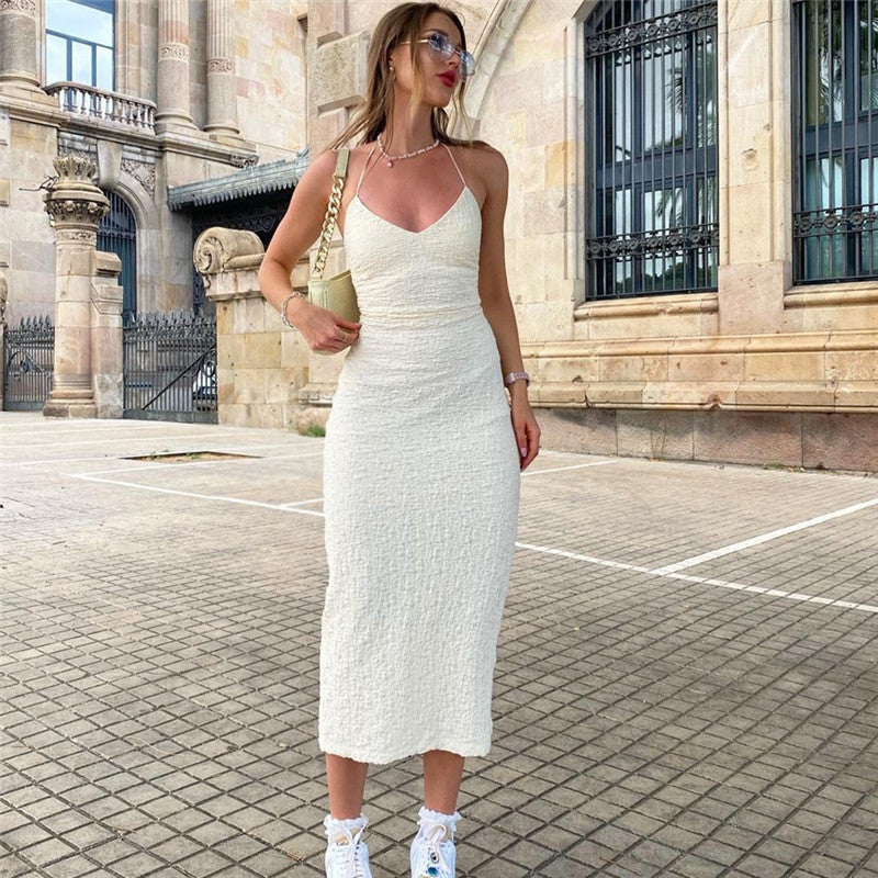 Plush Fashion Hub women's mid-length halter dress with V-neck, lace-up back, cutout details, and split design in autumn style.