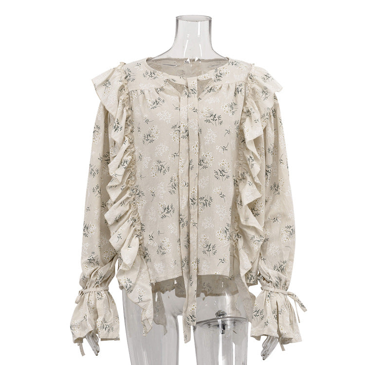 Bella Mia French design ruffled tied printed women's shirt with round neck and flared sleeves, suitable for office and casual wear.