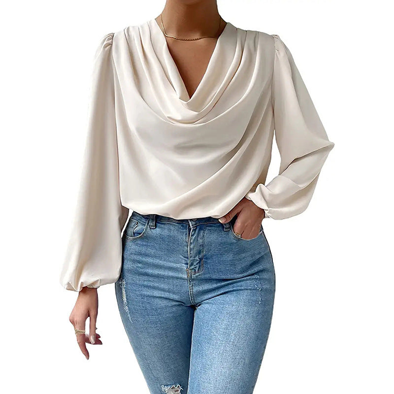 Loose draped V-neck long-sleeved shirt for women by Bella Mia, featuring a relaxed fit and casual style.