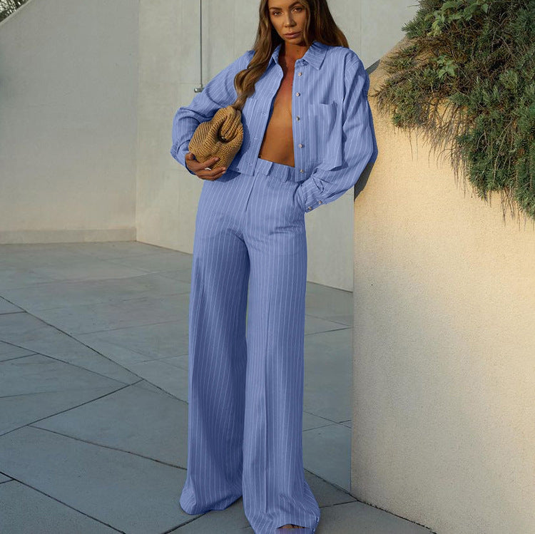 Women’s striped collared long sleeve short shirt and loose wide-leg pants two-piece set by Bella Mia, shown in a casual fashion style.