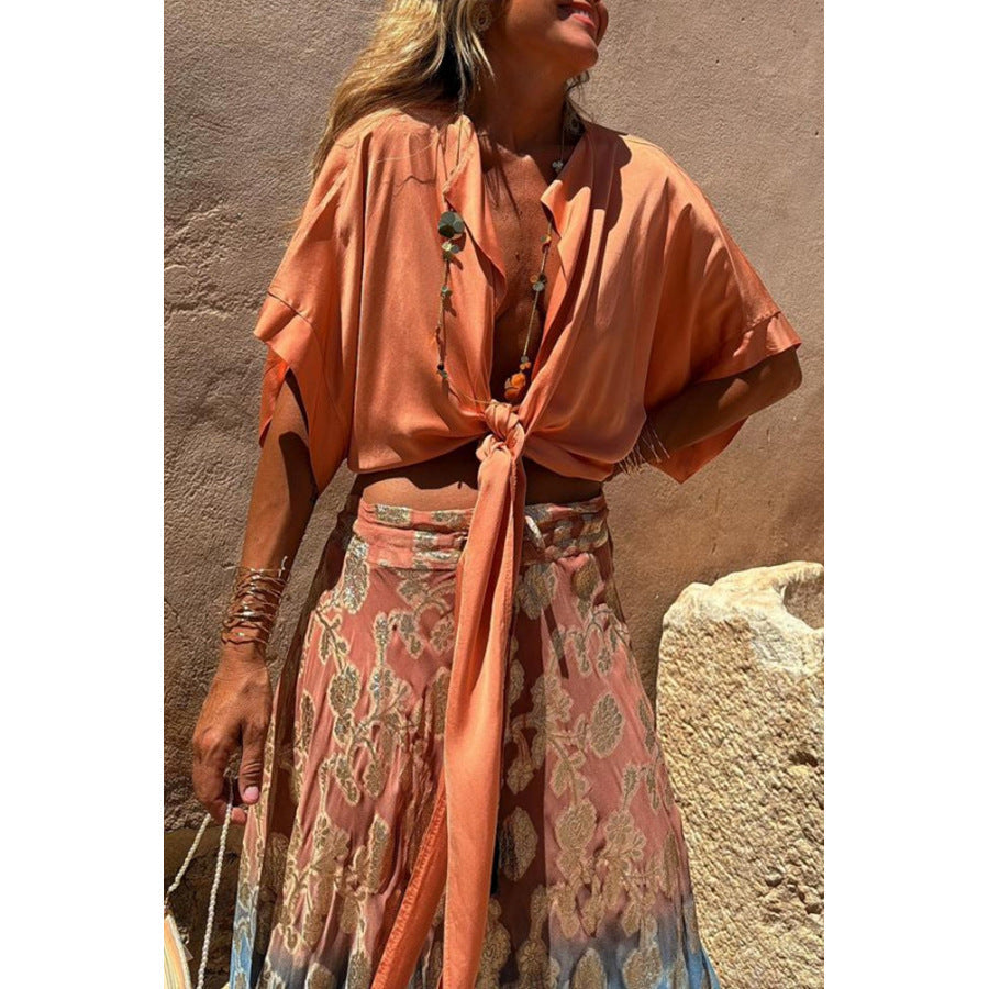 Colorful lace-up vacation cardigan for women with batwing sleeves, casual loose fit, ideal for spring and summer wear.