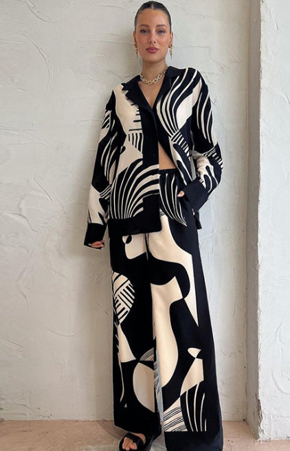 Women’s casual clothing set with printed design from Wanita Store, featuring comfortable matching top and pants.
