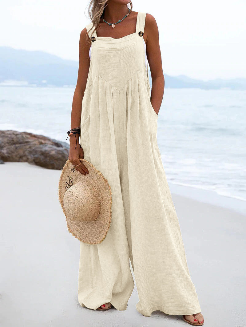 Women’s summer jumpsuit by Bella Mia featuring ethnic solid color design and wide-leg style, perfect for warm-weather wear.