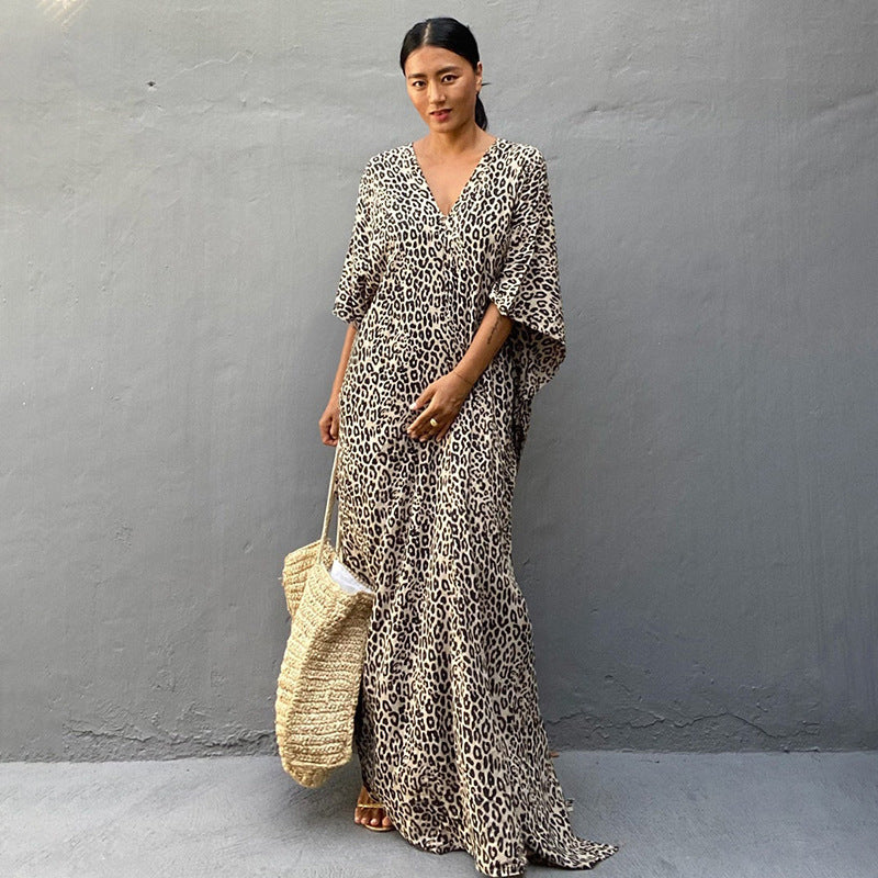 Printed long beach cover-up skirt from Plush Fashion Hub, styled as a maxi dress and sun protection shirt for vacation and swimwear.