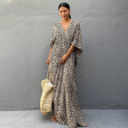 Printed long beach cover-up skirt from Plush Fashion Hub, styled as a maxi dress and sun protection shirt for vacation and swimwear.
