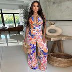 Women’s sleeveless lace-up wide-leg printed jumpsuit by Bella Mia, featuring a stylish design and vibrant print.