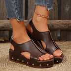 Bella Mia women's platform hollow out peep toe sandals with rivet accents, cutout design, velcro strap, and wedge heel for beach wear.