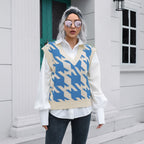 Bella Mia houndstooth V-neck women’s knit vest sweater, stylish autumn winter outerwear with boucle texture and layered look.