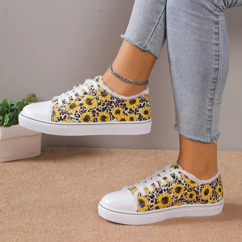Low top floral canvas shoes for women featuring a breathable design, stylish and comfortable footwear by Trendy Attic Store01.