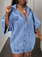 Oversized denim button-down shirt for women with batwing sleeves, featuring a relaxed fit and classic blue wash.