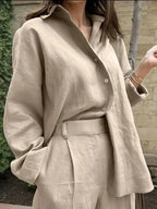Women's oversized long sleeve button-down shirt by Gilded Glamour Shop, relaxed casual chic top with a loose fit and classic collar.
