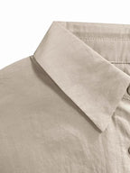 Women's oversized long sleeve button-down shirt from Gilded Glamour Shop, relaxed casual chic top with a loose fit and classic collar.