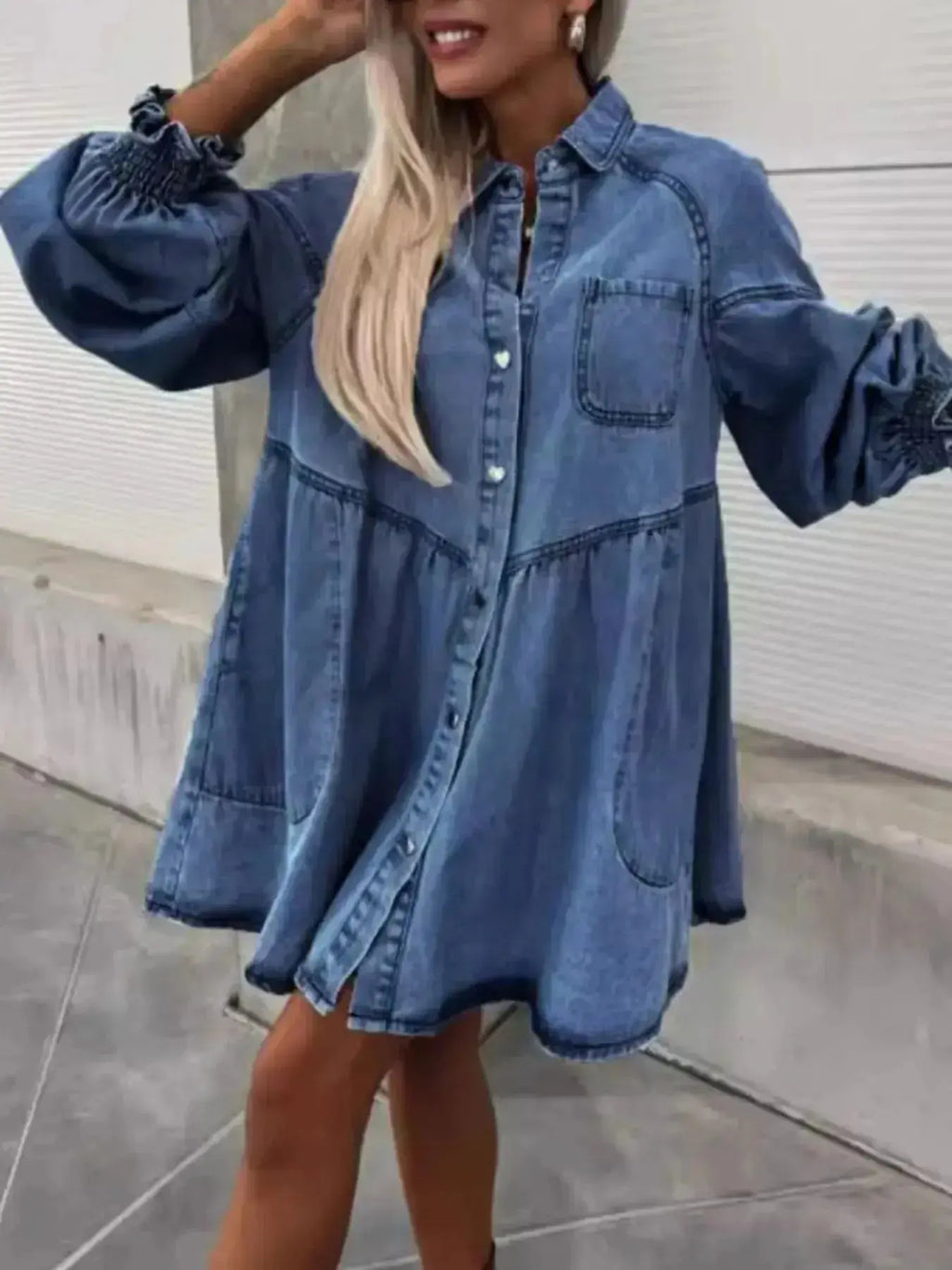 Oversized long sleeve button-up denim dress by Trendsi, featuring a casual fit and classic denim fabric.