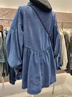Oversized long sleeve button-up denim dress by Trendsi featuring a relaxed fit, classic collar, and front button closure.