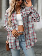 Oversized women's plaid button-down shirt by Plush Fashion Hub featuring soft flannel fabric and casual relaxed fit.