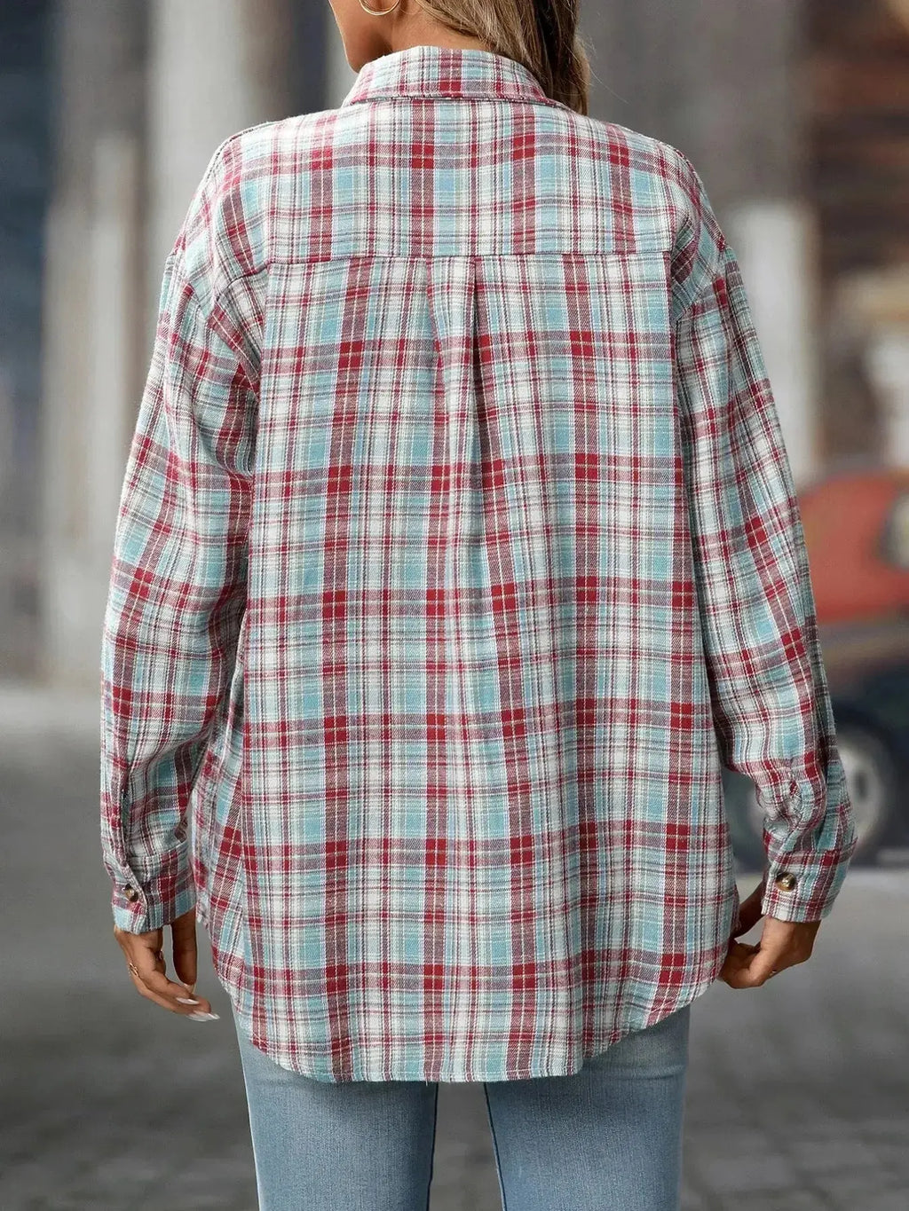 Oversized plaid button-down shirt for women by Plush Fashion Hub, soft casual flannel top with a relaxed fit and classic checkered pattern.