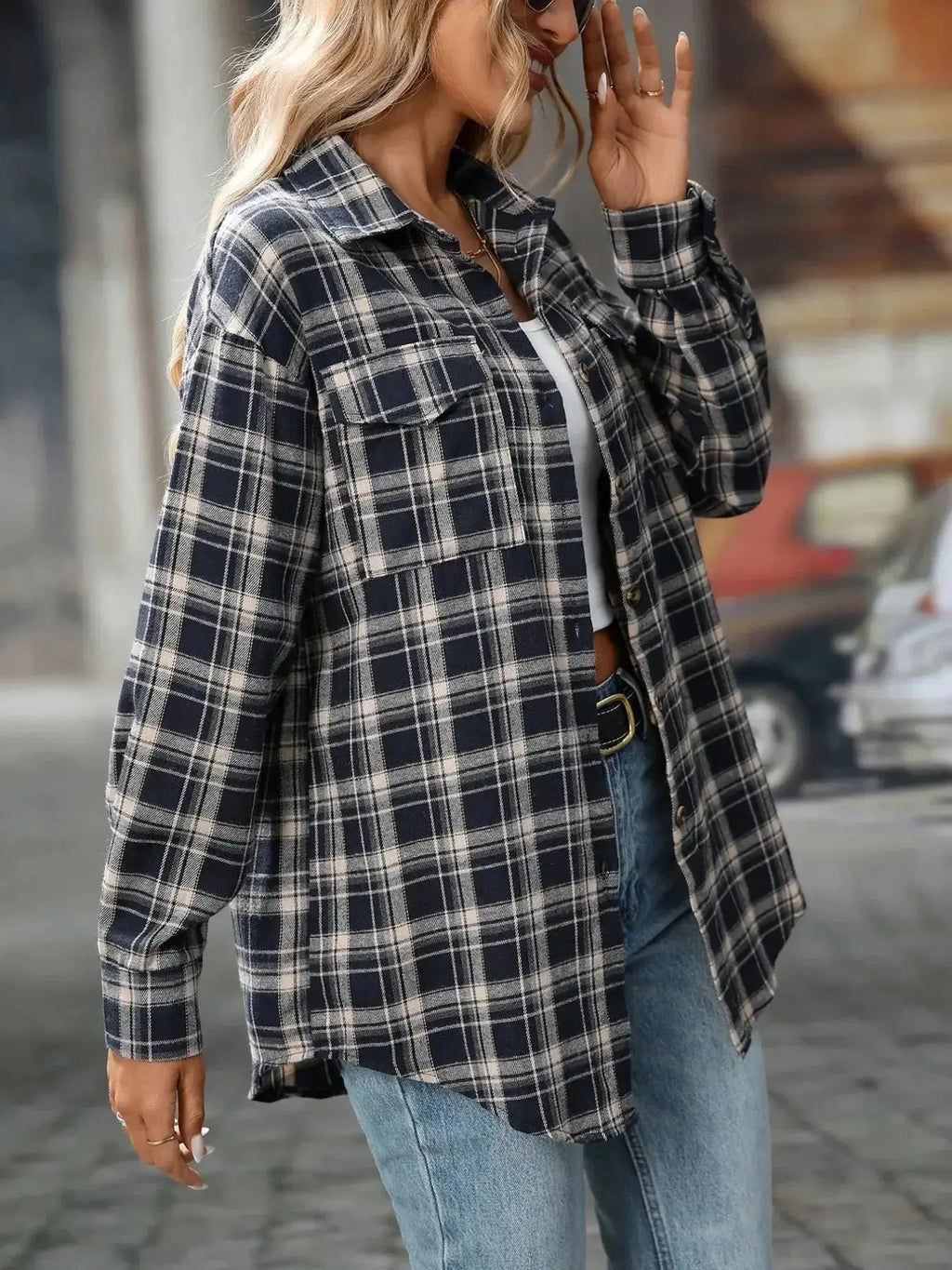 Oversized plaid button-down shirt for women by Plush Fashion Hub, soft casual flannel top with a relaxed fit and classic pattern.
