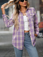 Women's oversized plaid button-down shirt by Plush Fashion Hub, soft casual flannel top with a relaxed fit and classic plaid pattern.