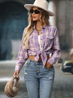 Oversized plaid button-down shirt for women by Plush Fashion Hub, soft casual flannel top with a relaxed fit and classic pattern.
