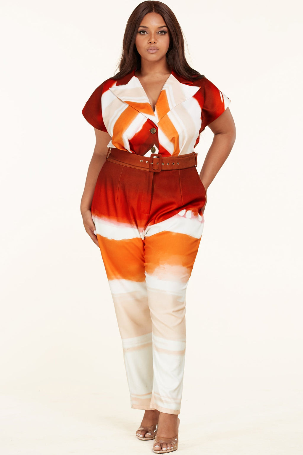 Plus size Sunset Jumpsuit by Fasheabe, stylish playsuit featuring a vibrant sunset design and comfortable fit.