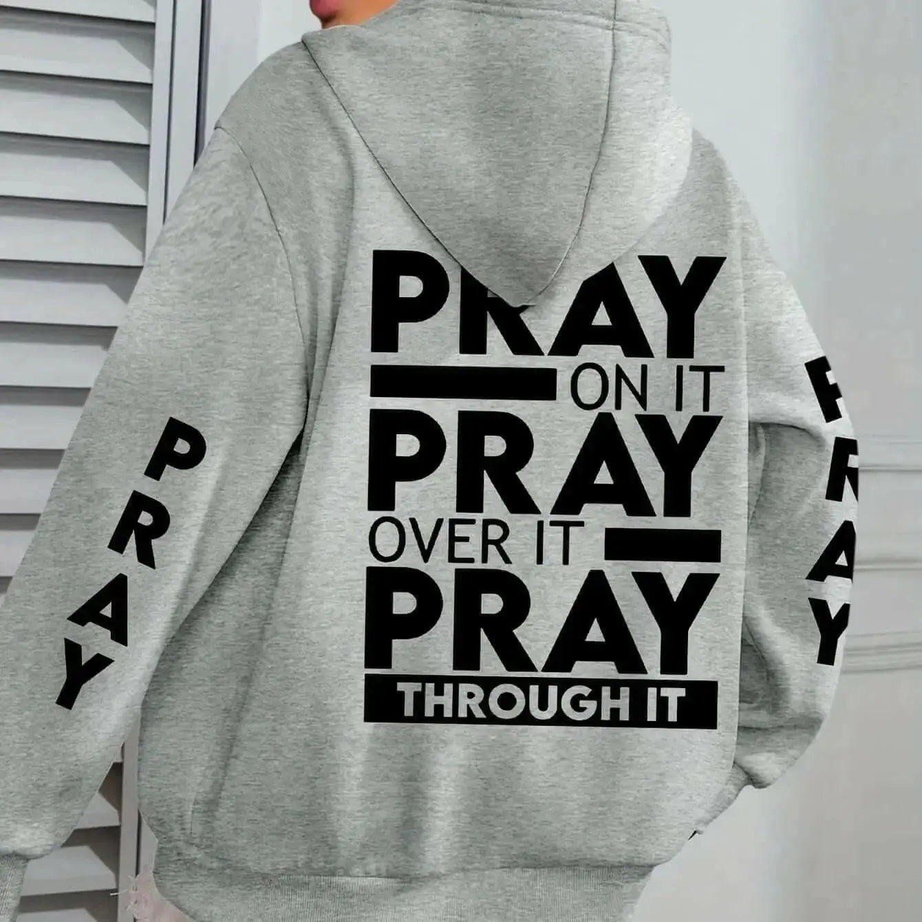 Plus size women's PRAY print kangaroo pocket hoodie by Plush Fashion Hub, cozy casual pullover with faith-themed design.