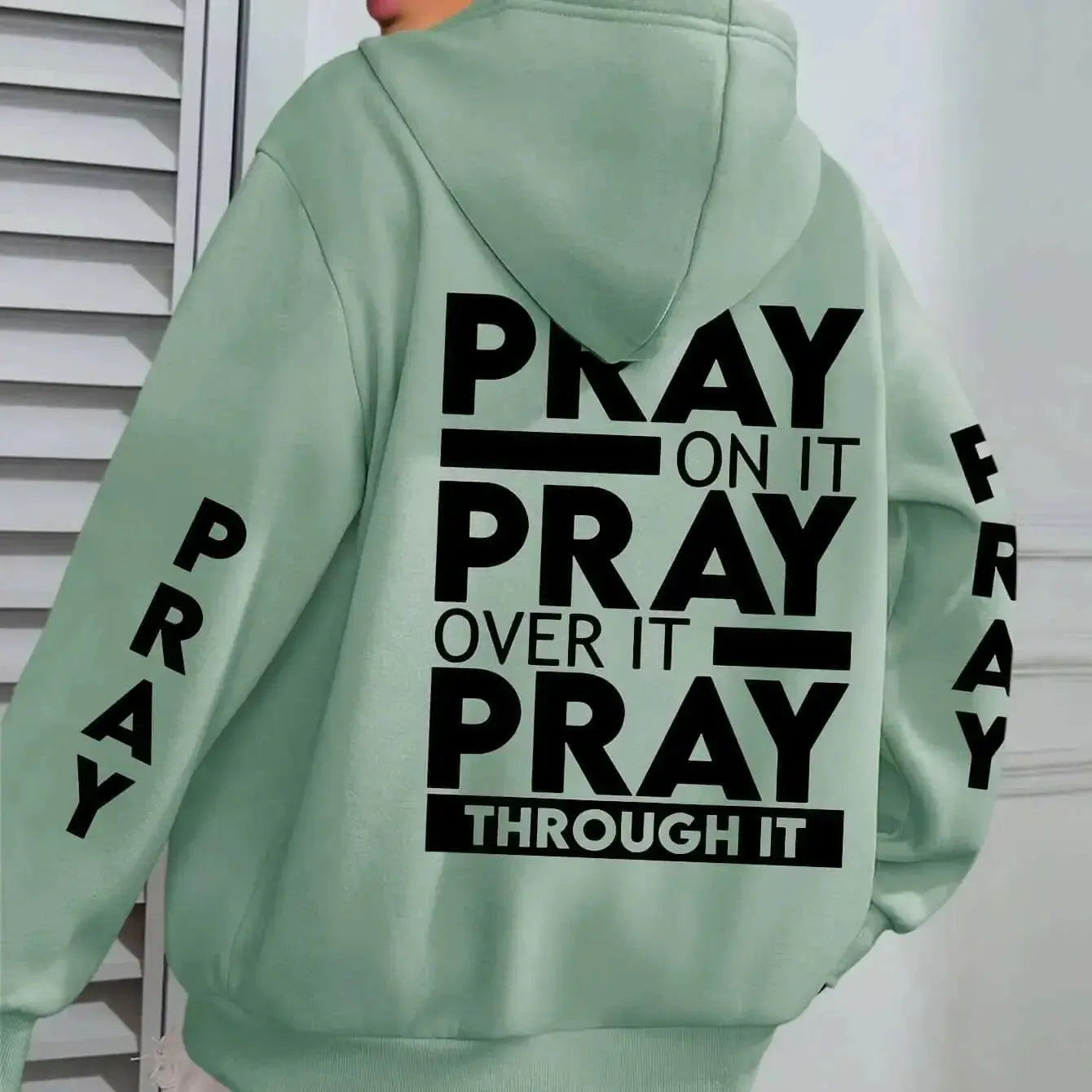 Plus size women's hoodie with PRAY print and kangaroo pocket, cozy casual pullover by Plush Fashion Hub.