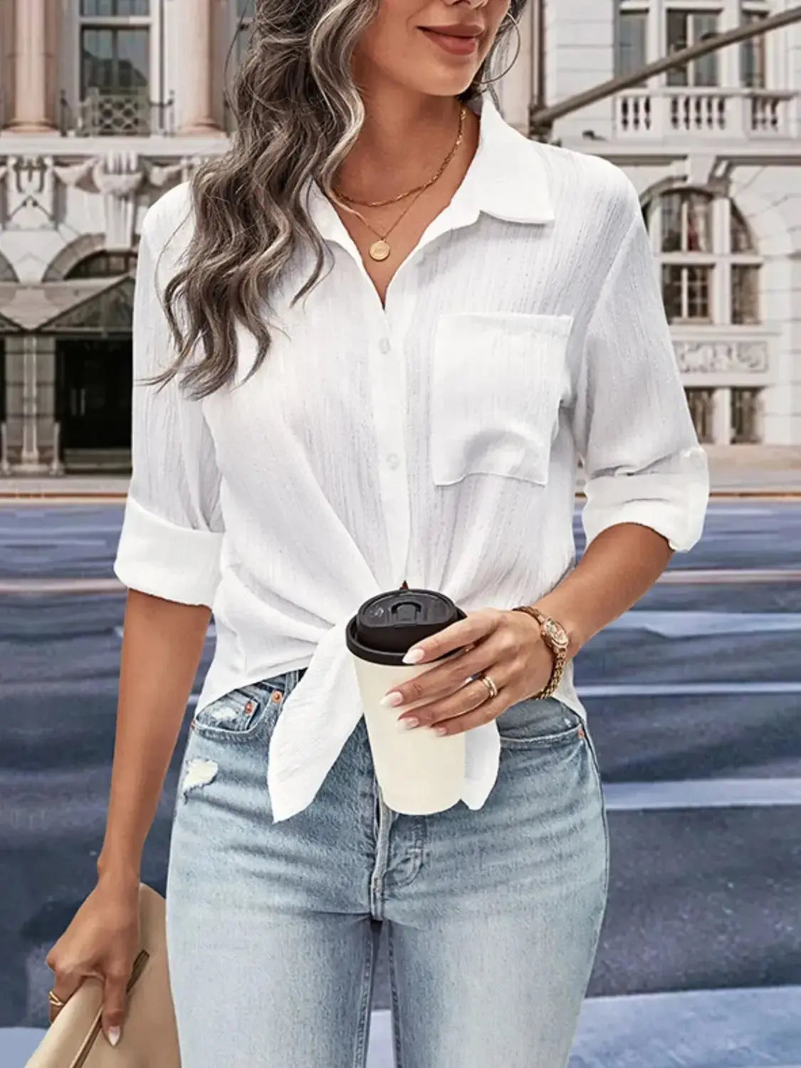 Women’s collared twisted front half sleeve shirt by Plush Fashion Hub, featuring a stylish collar and twisted front design.