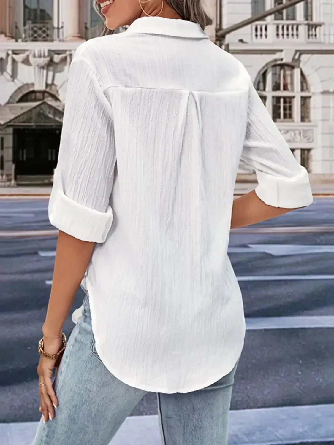 Women’s collared twisted front half sleeve shirt by Plush Fashion Hub, featuring a stylish collar and twisted front design.