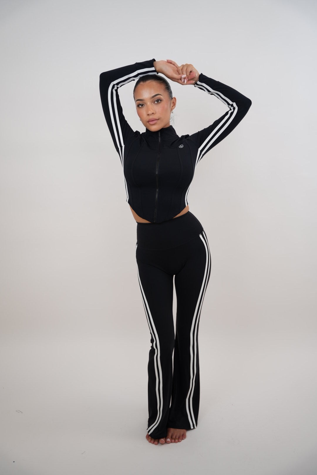 Black flare leggings for women by Plush Fashion Hub, featuring a comfortable fit and stylish flare design.