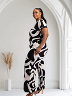 Fasheabe Lori print black and white plus size pants set with pockets, featuring a stylish matching top and bottoms.
