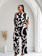 Fasheabe Lori print black and white matching plus size pants set with pockets, stylish and comfortable for everyday wear.