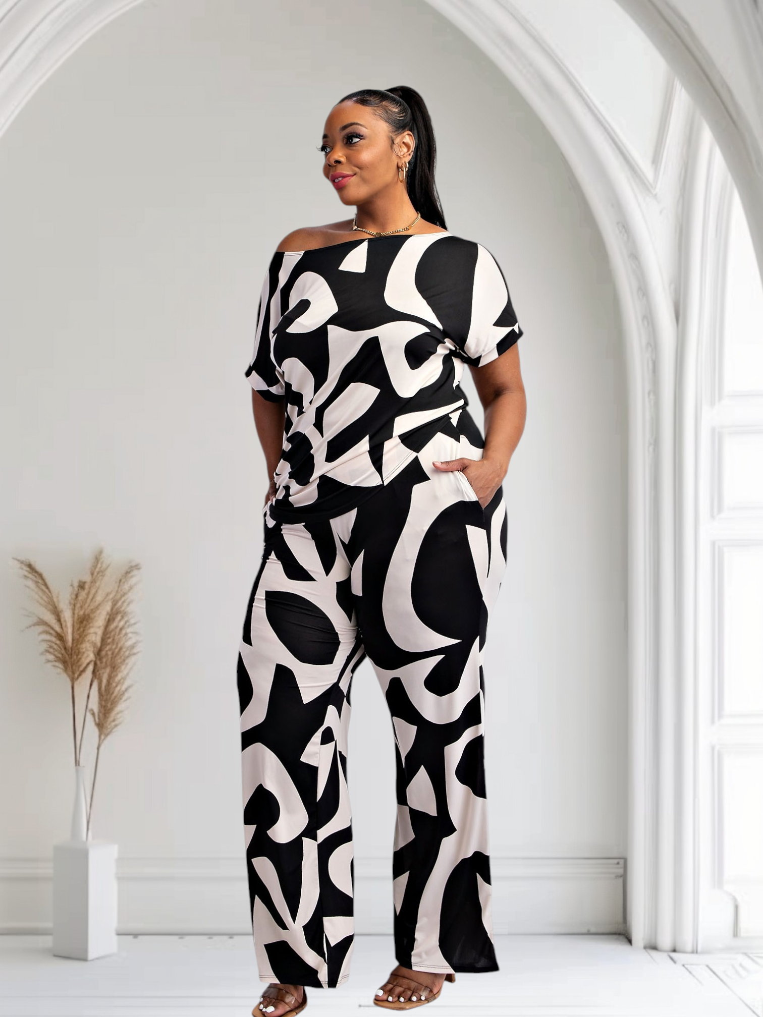 Fasheabe Lori print black and white matching plus size pants set with pockets, stylish and comfortable for everyday wear.