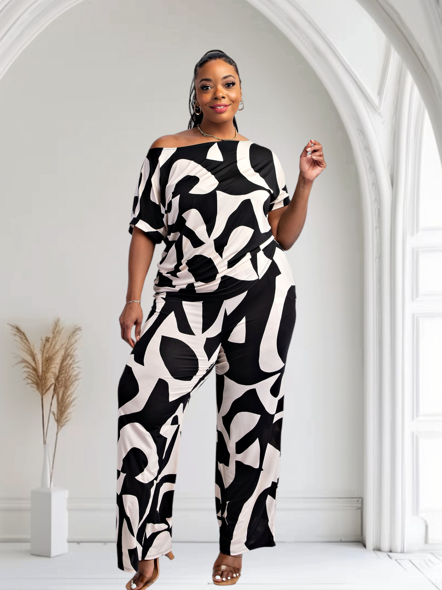 Fasheabe Lori print black and white matching plus size pants set with pockets, featuring a stylish, coordinated two-piece outfit.