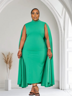 Green Stella Cape Plus Size Midi Dress by Fasheabe, showcasing flowing fabric and elegant design on a model.