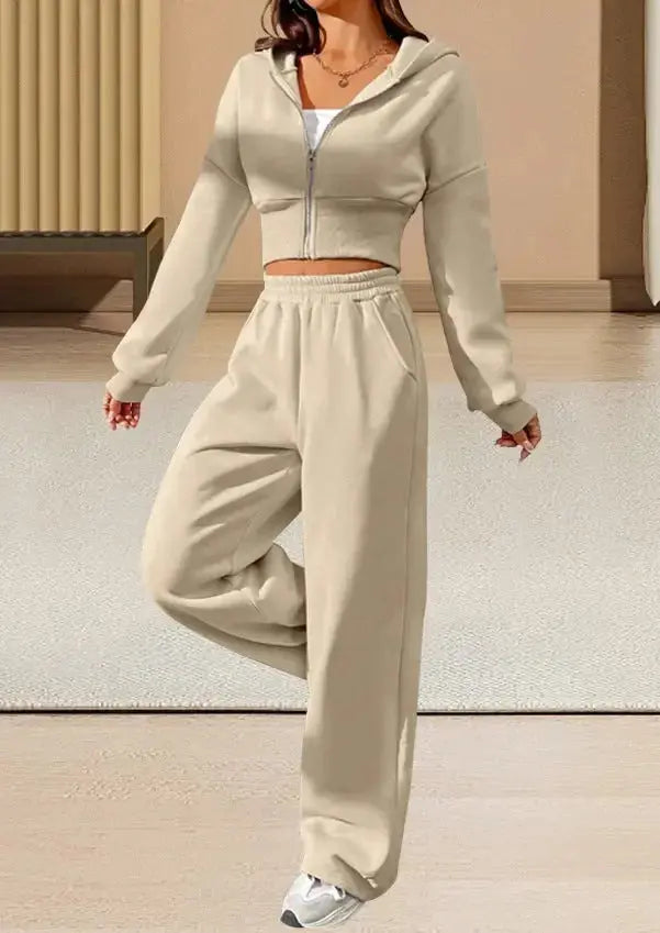 Pink women's 2-piece hooded sweatshirt and jogger pants set from Plush Fashion Hub, featuring a front zip hoodie and matching pants.