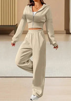 Pink women's 2-piece hooded sweatshirt and jogger pants set from Plush Fashion Hub, featuring a front zip hoodie and matching pants.