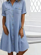 Plus size button-front short sleeve denim dress by Plush Fashion Hub, casual midi style with flattering fit and classic denim look.