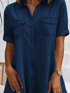Plus size button-front short sleeve denim dress by Plush Fashion Hub, casual midi style with flattering fit.