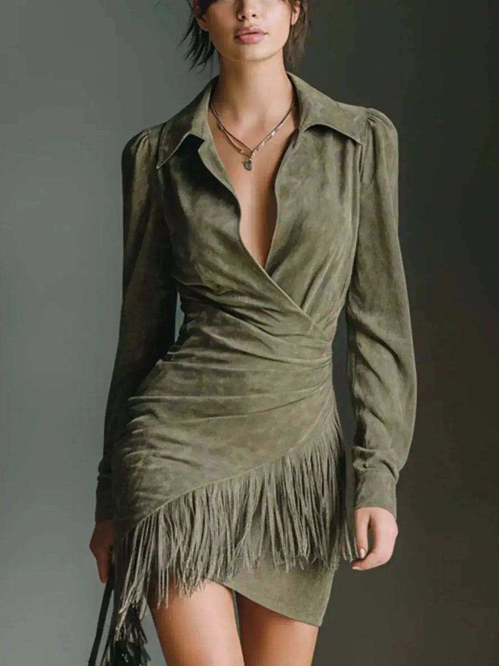 Plus size long sleeve suede boho dress with fringe and bohemian style, featuring a chic shift silhouette from Trendsi.