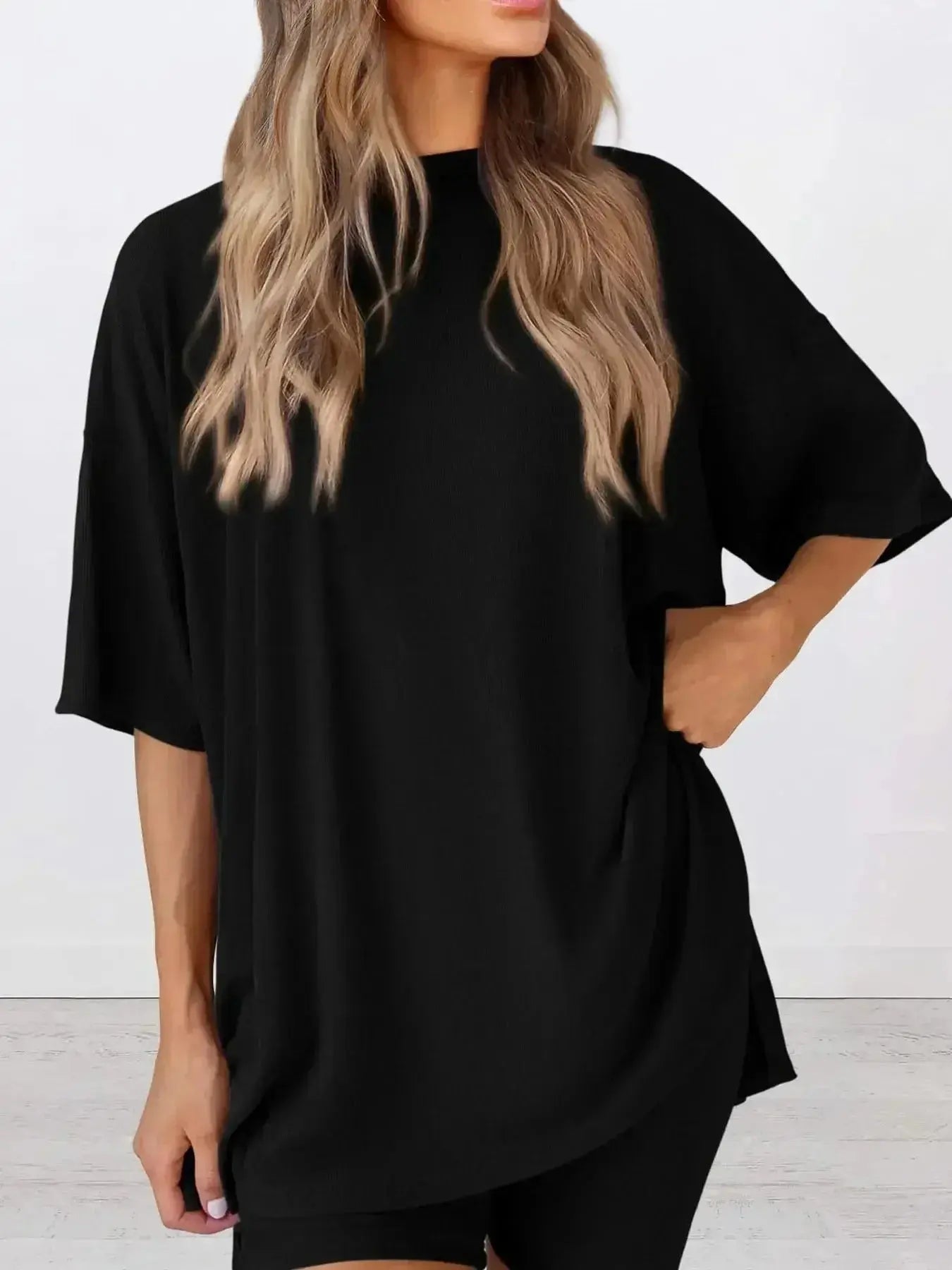 Plus size oversized slit neck lounge set made of soft rayon pajamas for women, featuring a relaxed fit and comfortable design.