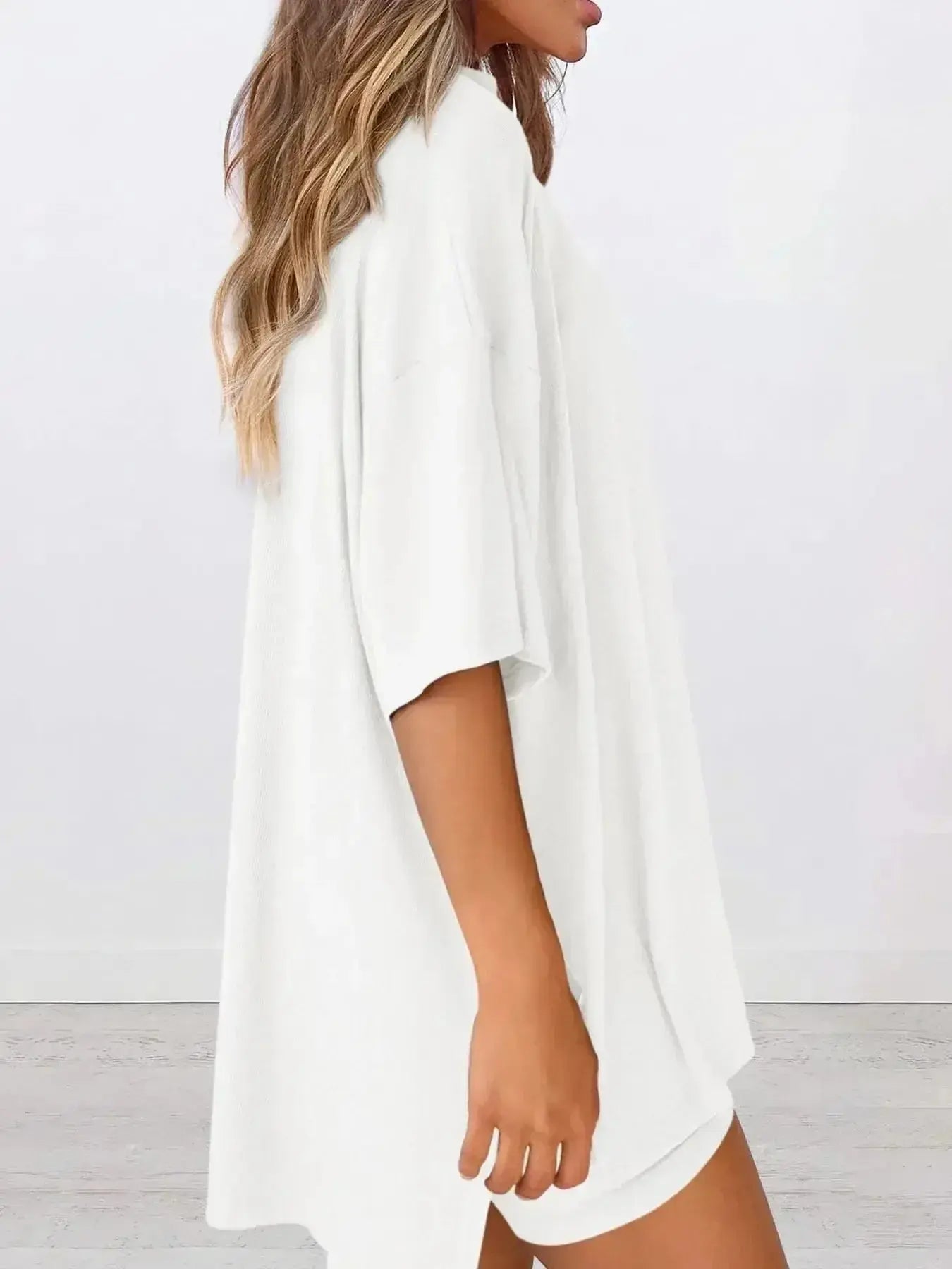 Plus size oversized slit neck lounge set made of soft rayon pajamas for women, featuring a relaxed fit and comfortable design.