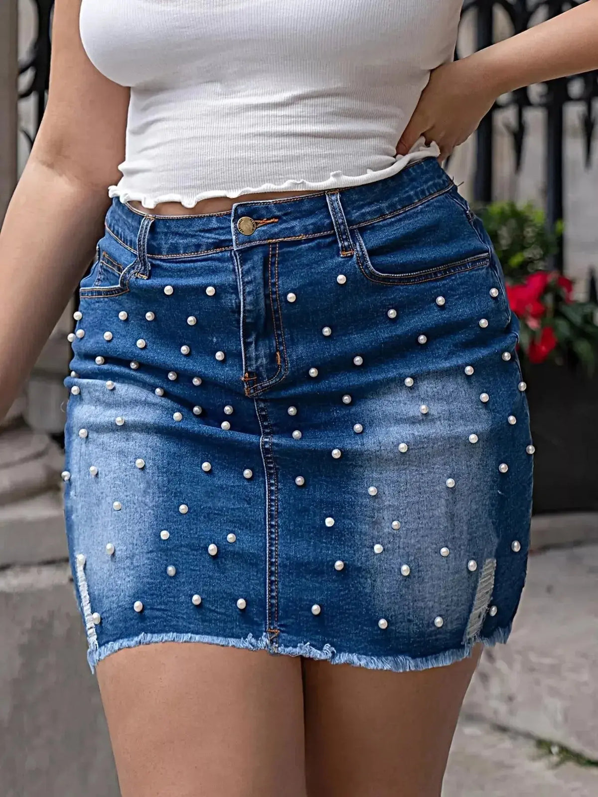 Plus size pearl-embellished raw hem denim midi skirt by Plush Fashion Hub, casual stylish denim with decorative pearls.