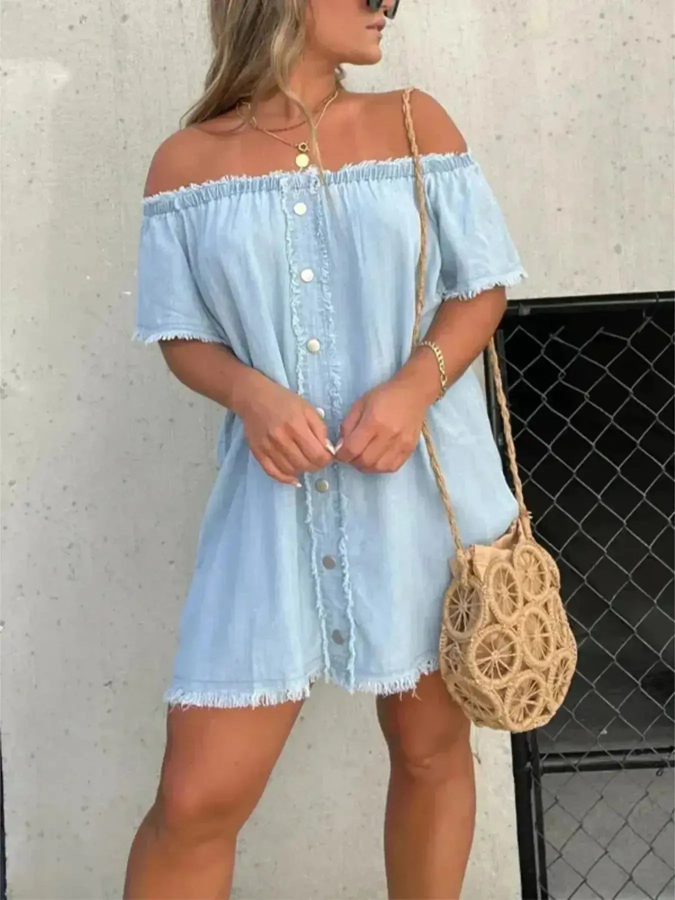 Plus size raw hem mini denim button-down dress by Trendsi, featuring a stretchy casual jean style with a relaxed fit.