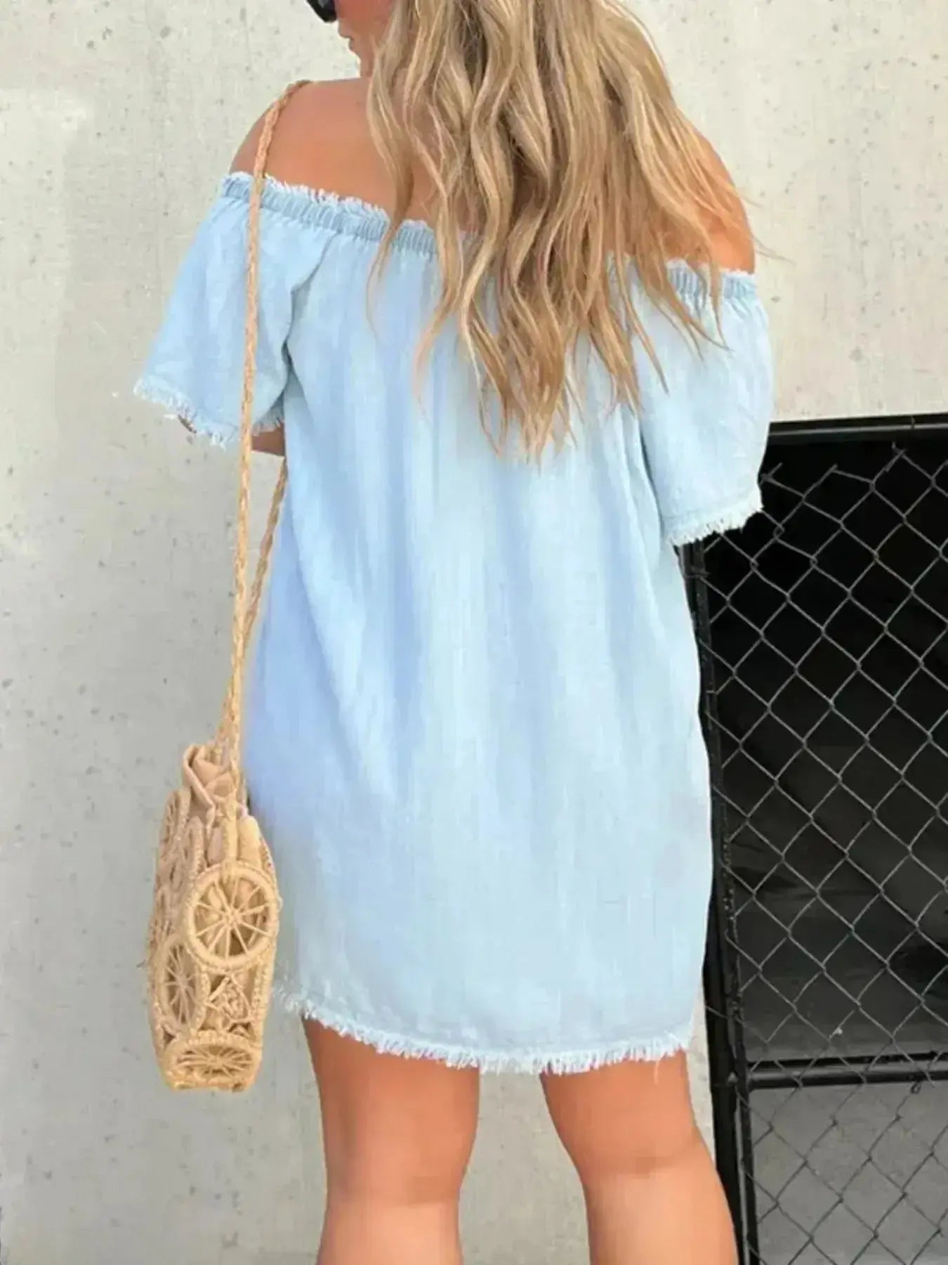 Plus size raw hem mini denim button-down dress by Trendsi featuring stretchy casual jean fabric and a stylish casual design.