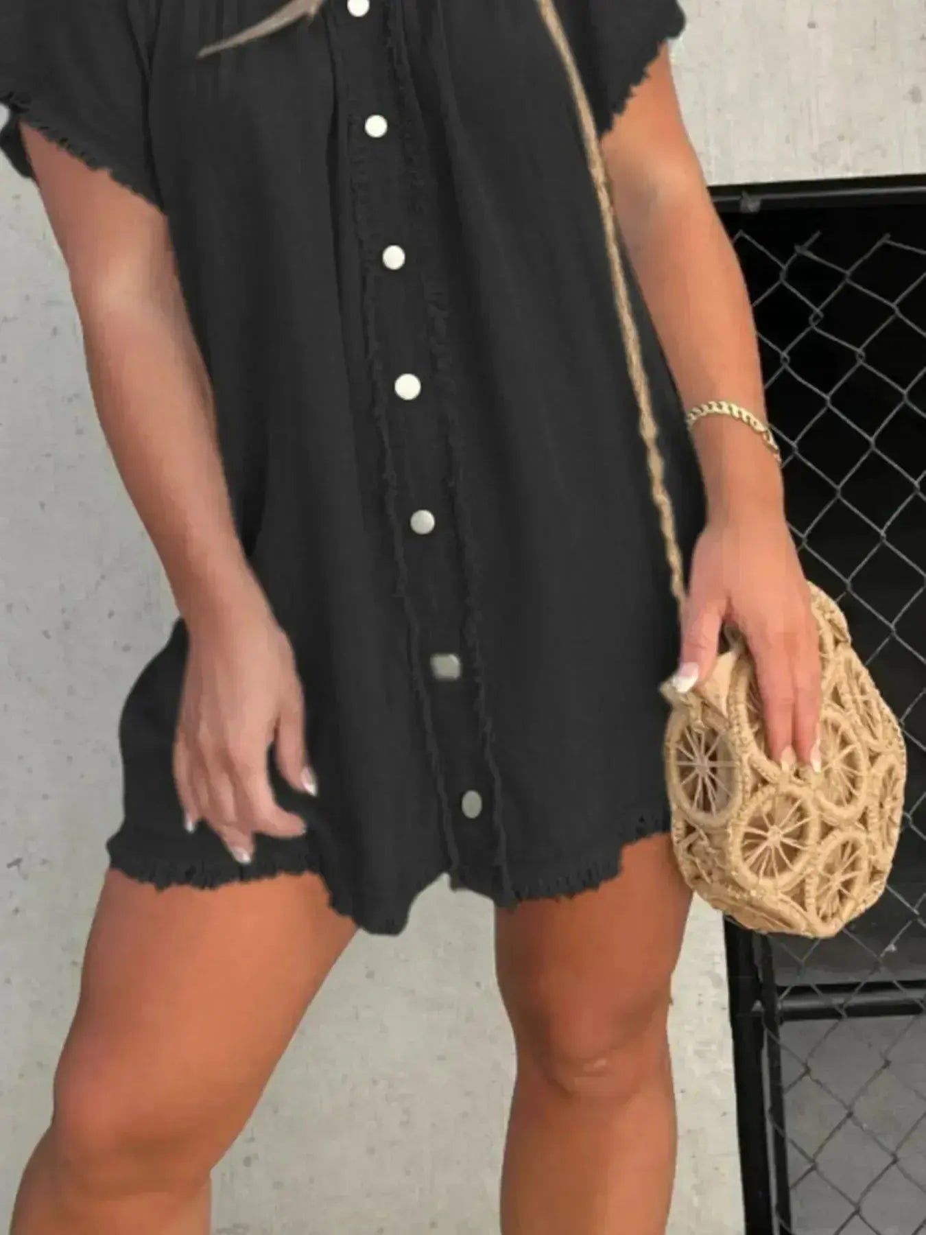 Plus size raw hem mini denim button-down dress by Trendsi, featuring a stretchy casual jean style with a relaxed fit.
