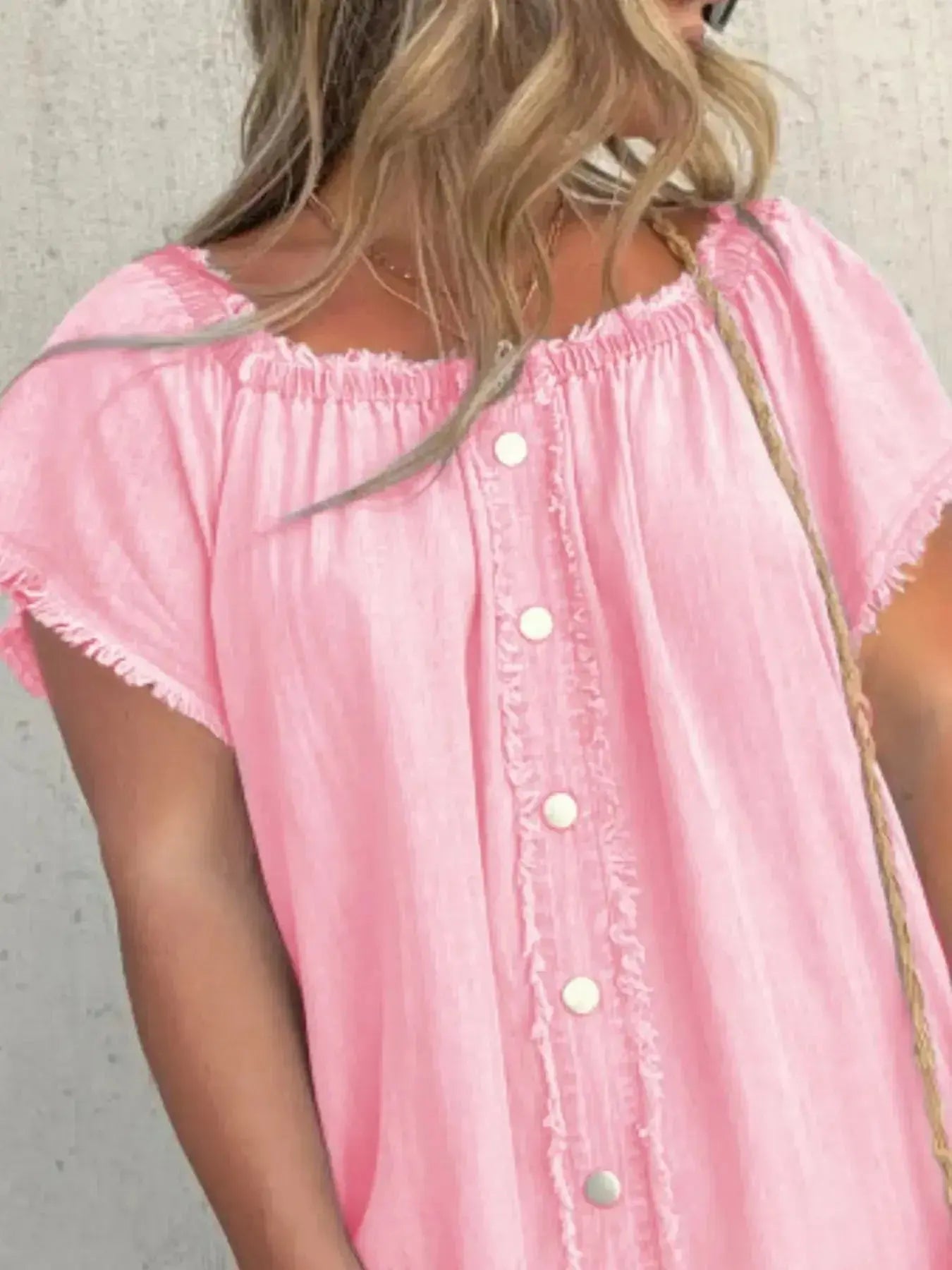 Plus size raw hem mini denim button-down dress by Trendsi, featuring a stretchy casual jean style with a relaxed fit.